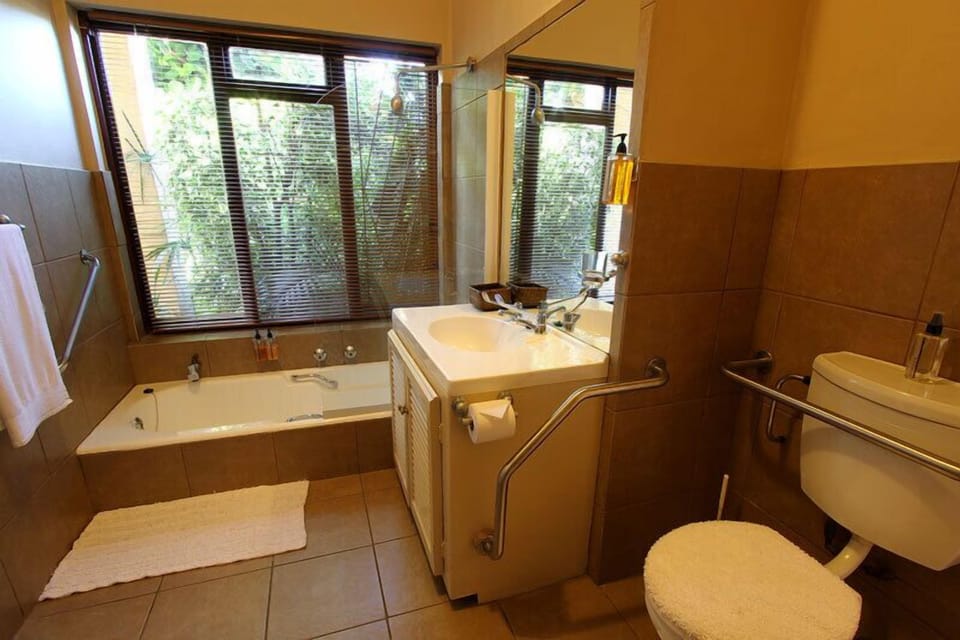 Double with wheelchair friendly en-suite | Bathroom | Free toiletries, hair dryer, towels