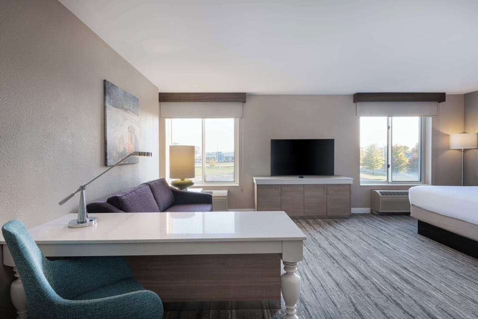 Room, 1 King Bed with Sofa bed | Living area | Flat-screen TV