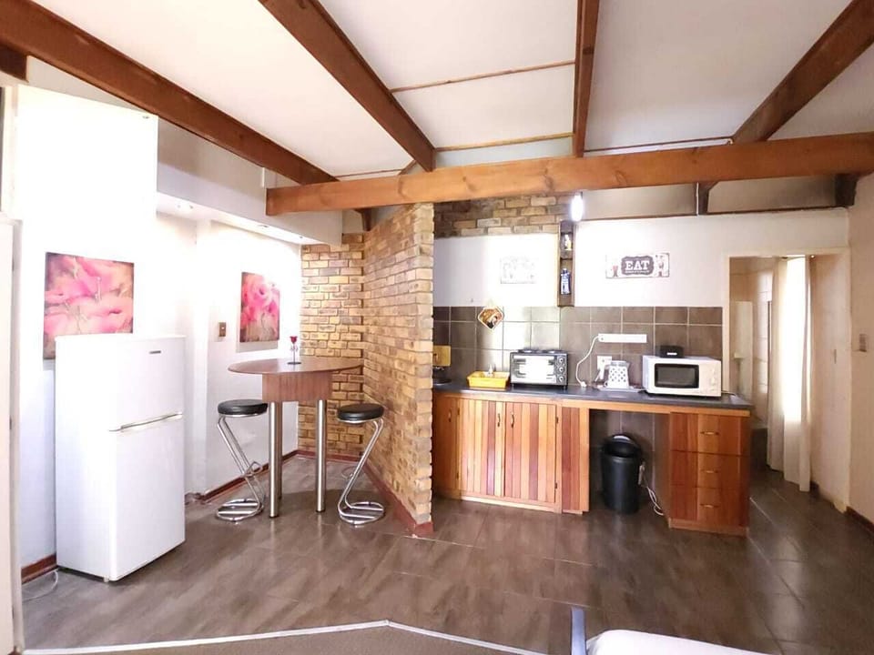 Executive Double Room | Private kitchen | Coffee/tea maker