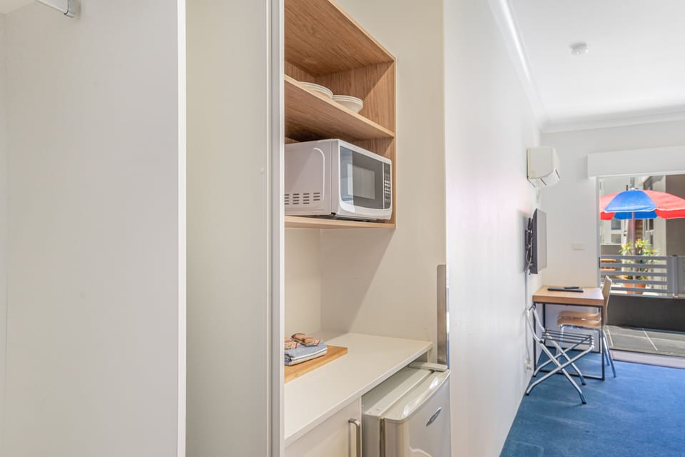 Standard Triple Room | Private kitchenette | Coffee/tea maker, mini-fridge, microwave, electric kettle