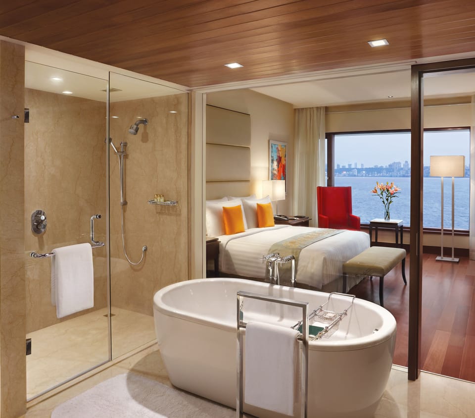 Deep soaking tub, designer toiletries, hair dryer, slippers