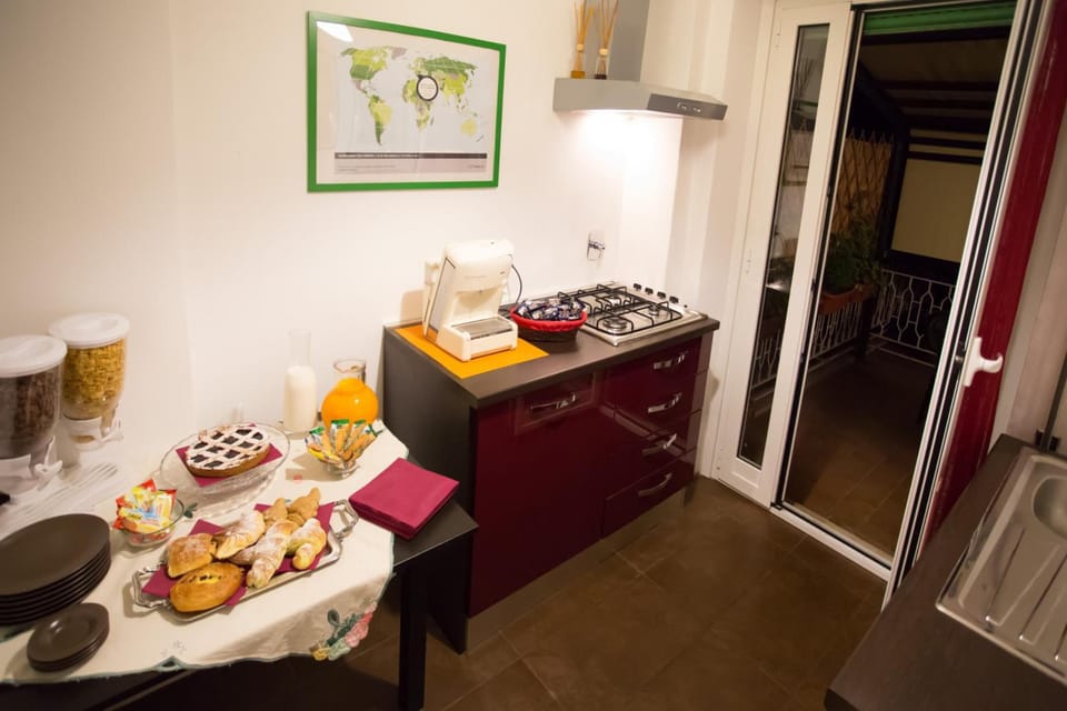 Full-size fridge, stovetop, coffee/tea maker, electric kettle