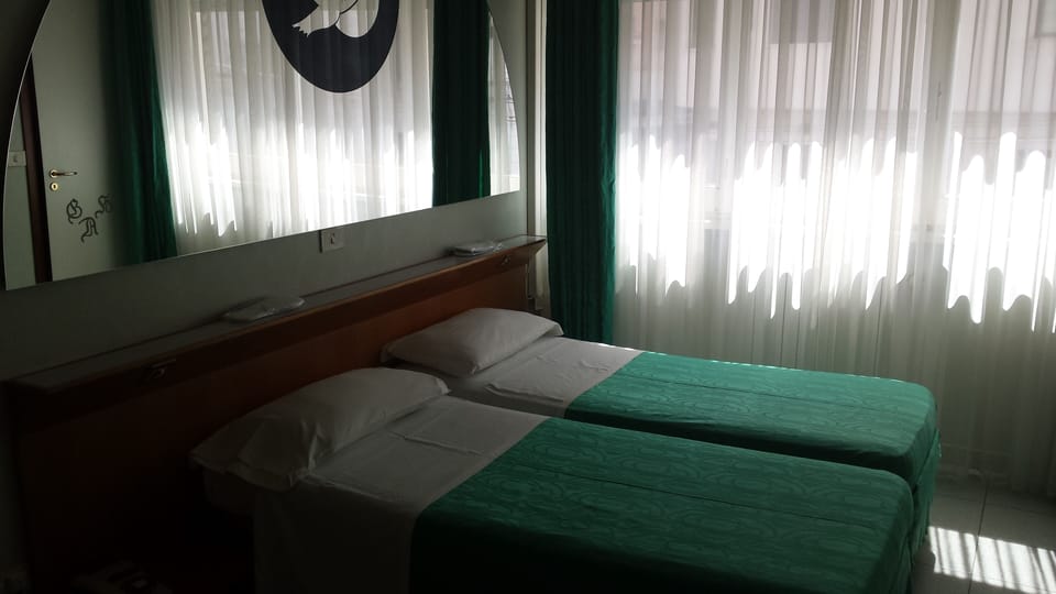 Desk, blackout drapes, soundproofing, free WiFi
