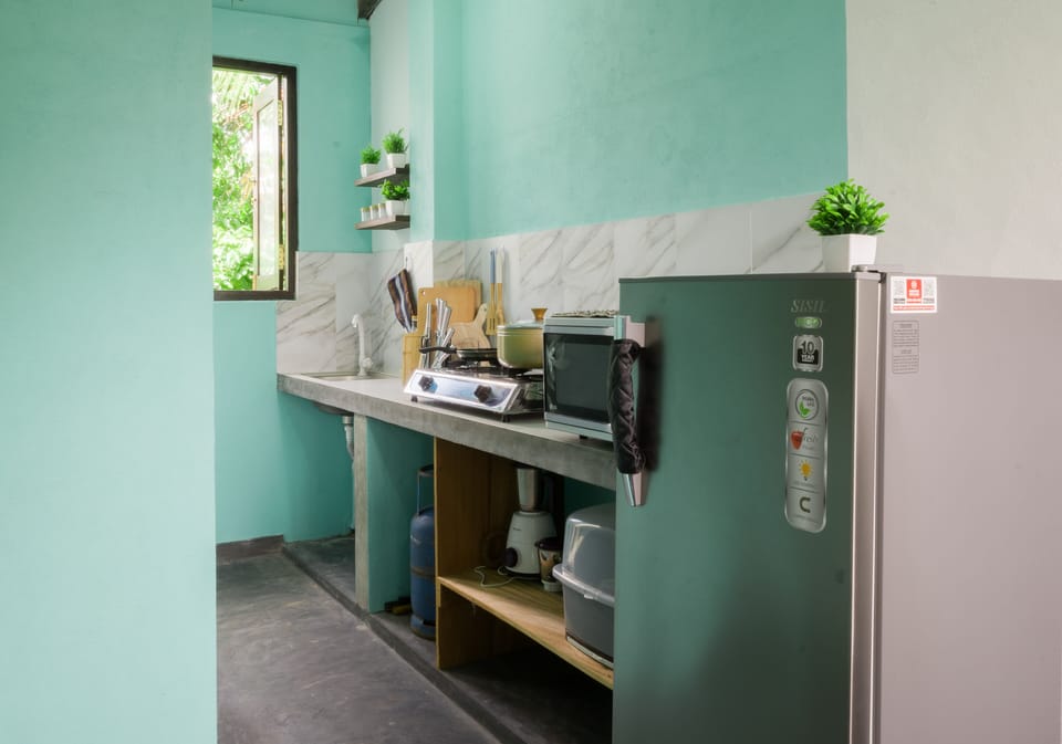Comfort Studio, 1 King Bed, Garden View | Private kitchen | Refrigerator (on request), shared microwave