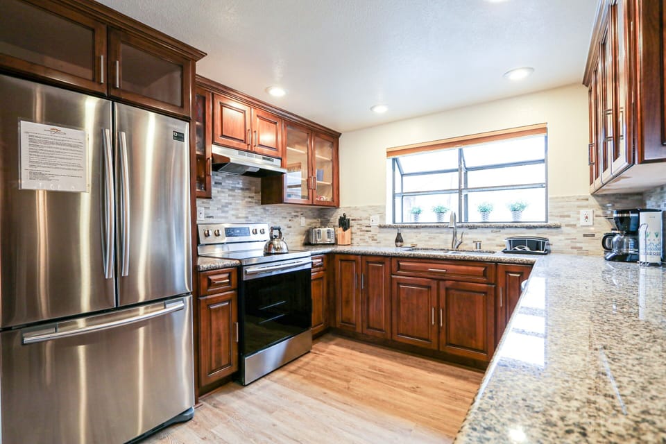 Condo, 2 Bedrooms | Private kitchen | Fridge, microwave, dishwasher, coffee/tea maker