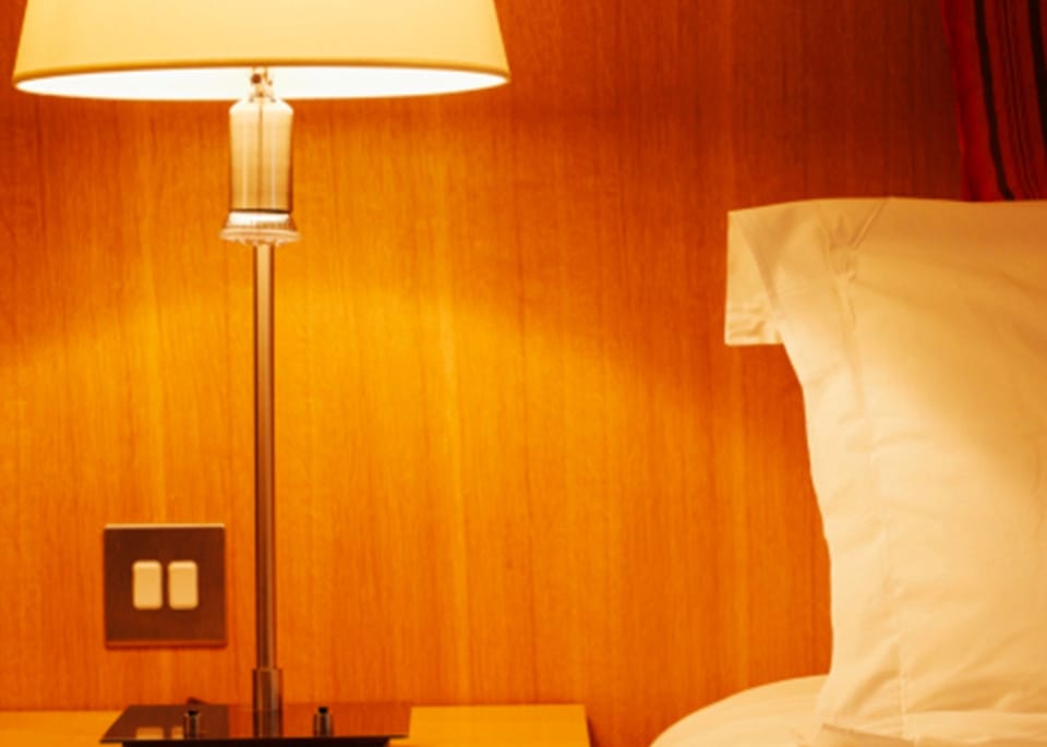 Premium bedding, desk, blackout drapes, iron/ironing board (on request)