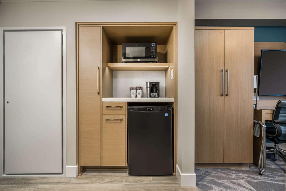 Suite, 1 King Bed with Sofa bed | 1 bedroom, pillowtop beds, in-room safe, blackout drapes