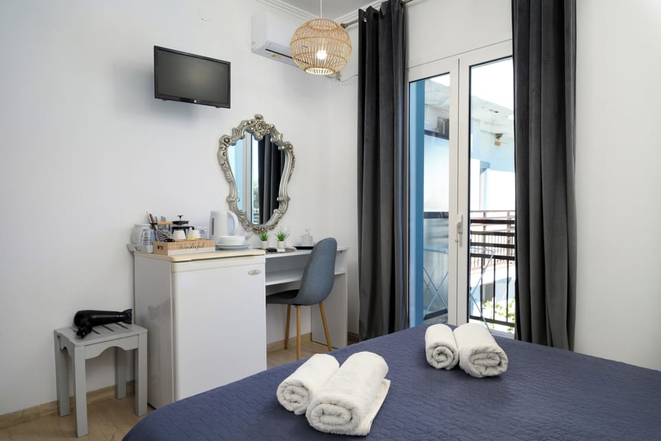 Double Room, Pool View | Desk, blackout drapes, soundproofing, iron/ironing board