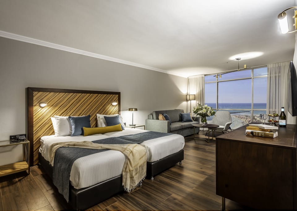 Premier Studio, Balcony, Sea View | Minibar, in-room safe, desk, laptop workspace