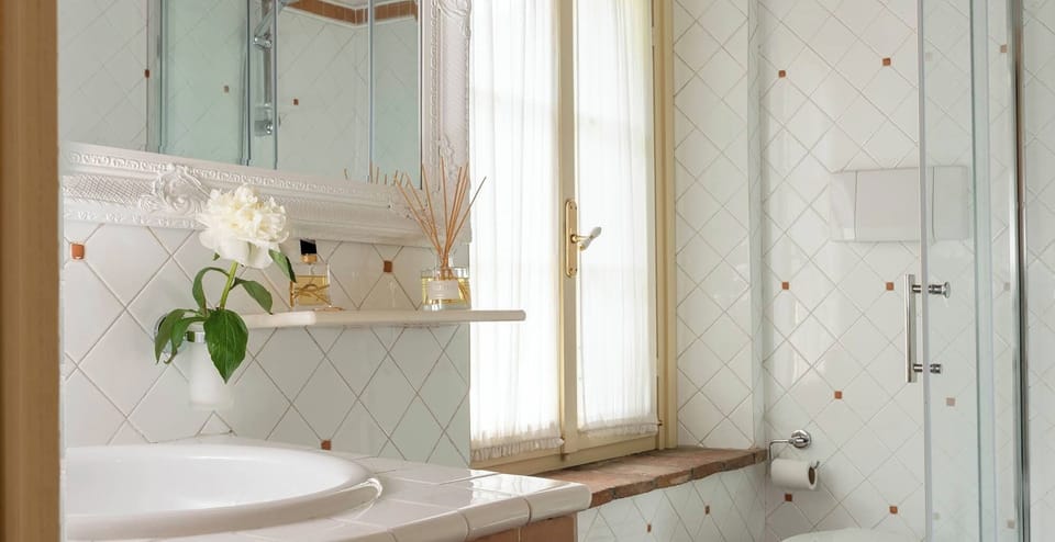 Shower, rainfall showerhead, bidet, towels