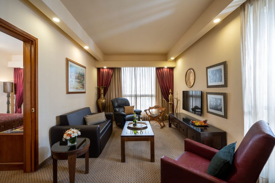 Suite, 1 Bedroom, Balcony | Living area | 36-inch LCD TV with satellite channels, TV