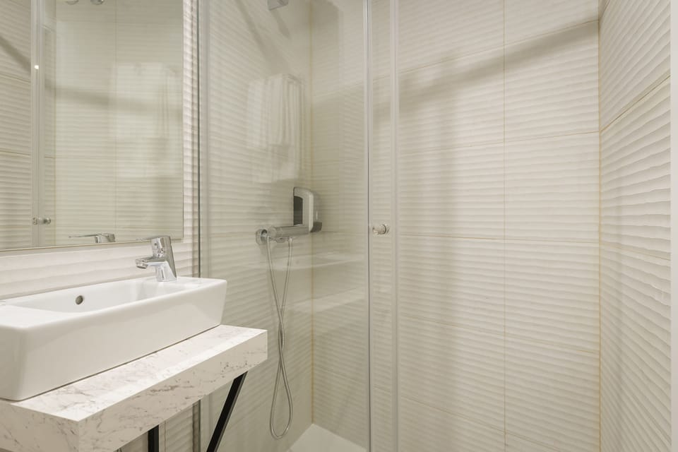 Deep soaking tub, eco-friendly toiletries, hair dryer, bidet