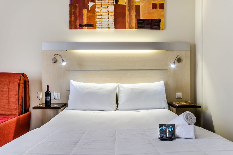 Premium bedding, down comforters, desk, blackout drapes