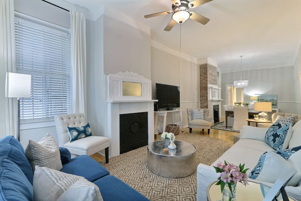 Living room to dining room, open space with lots of seating for large groups