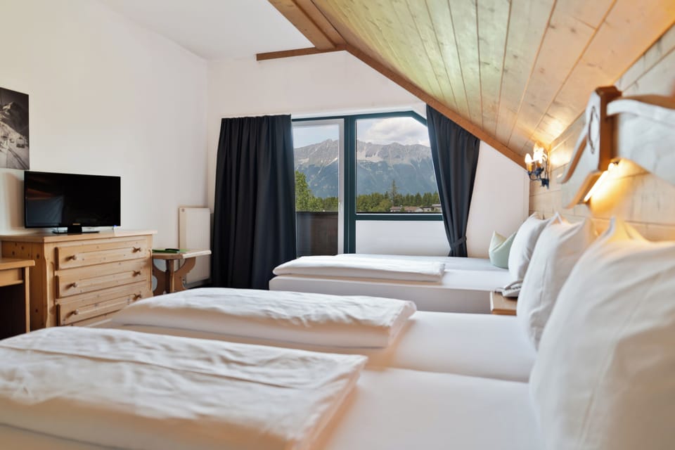 Standard Triple Room, Mountain View | Individually decorated, individually furnished, soundproofing, free WiFi