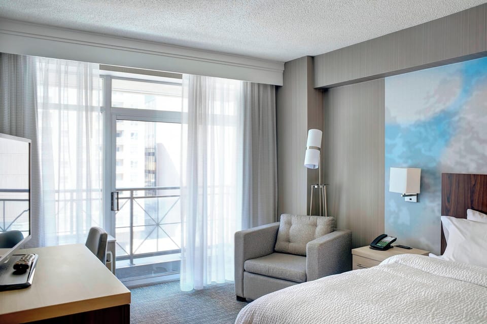 Room, 1 King Bed, Balcony (Corner) | In-room safe, desk, soundproofing, iron/ironing board