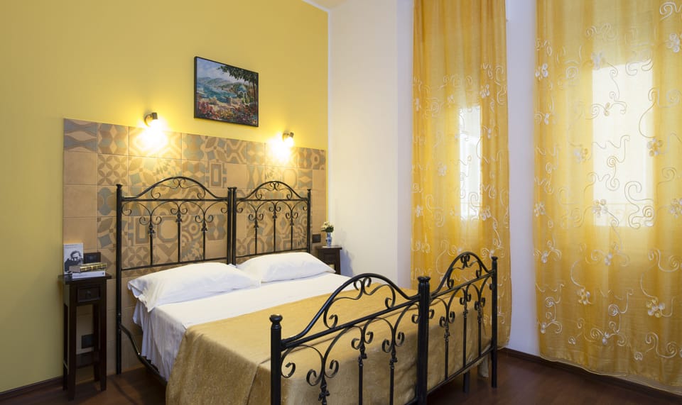 Basic Double Room | In-room safe, individually decorated, desk, laptop workspace
