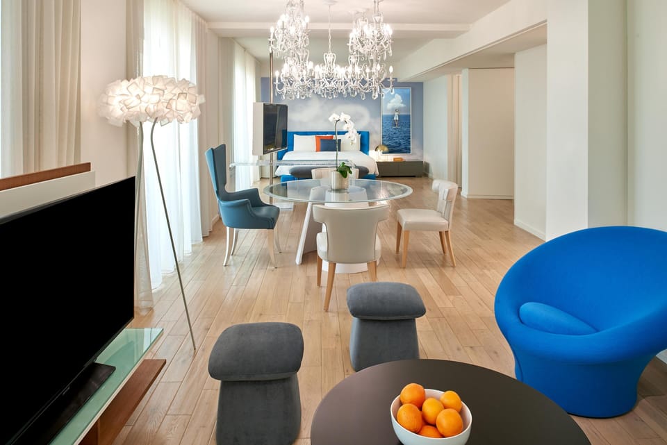 Loft, 1 King Bed, Balcony (Skyview) | Living area | 50-inch flat-screen TV with digital channels, TV, pay movies