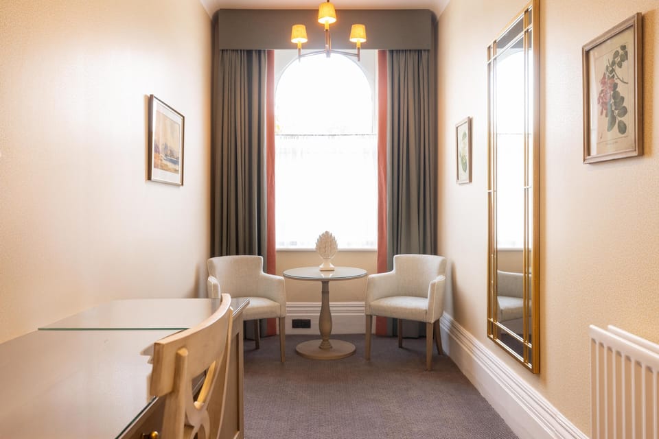 Suite, 1 King Bed, Non Smoking (Shower Only) | Premium bedding, in-room safe, individually decorated