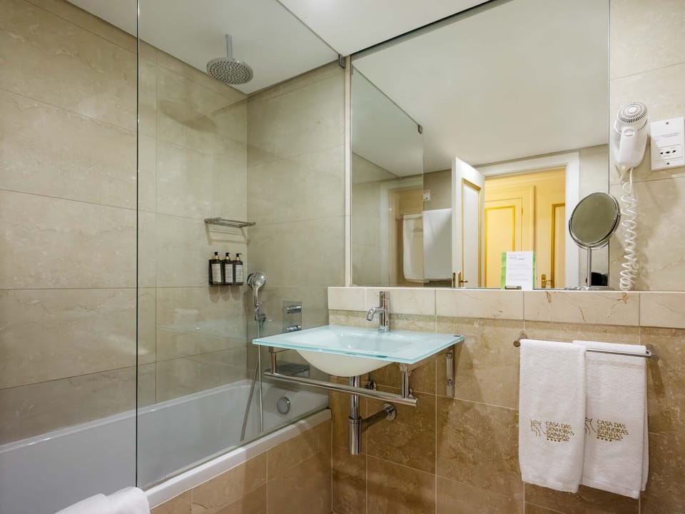 Charming Twin Balcony | Bathroom | Combined shower/tub, deep soaking tub, rainfall showerhead