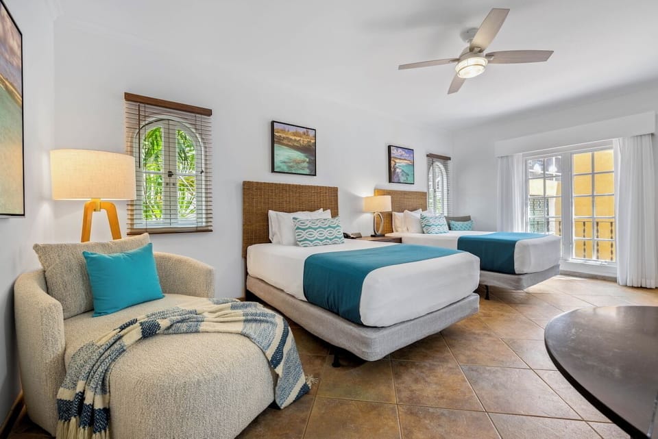 Standard Double Room, 2 Double Beds, Courtyard View | Premium bedding, pillowtop beds, in-room safe, individually decorated