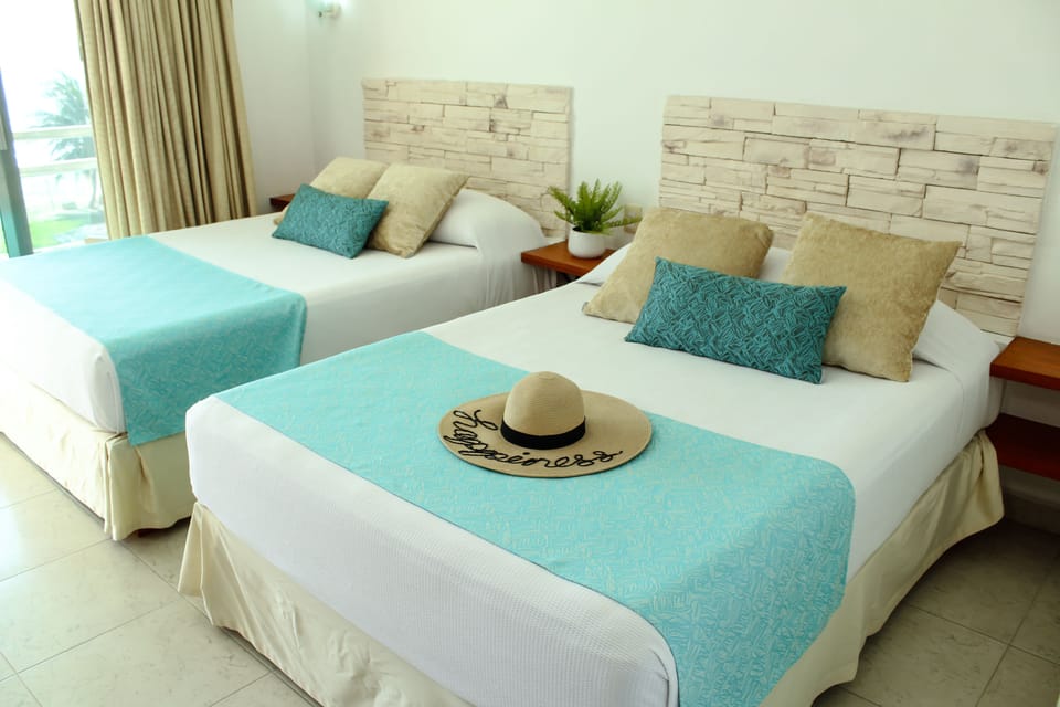 Standard Room, 1 Bedroom, Ocean View, Oceanfront | Minibar, in-room safe, individually furnished, blackout drapes
