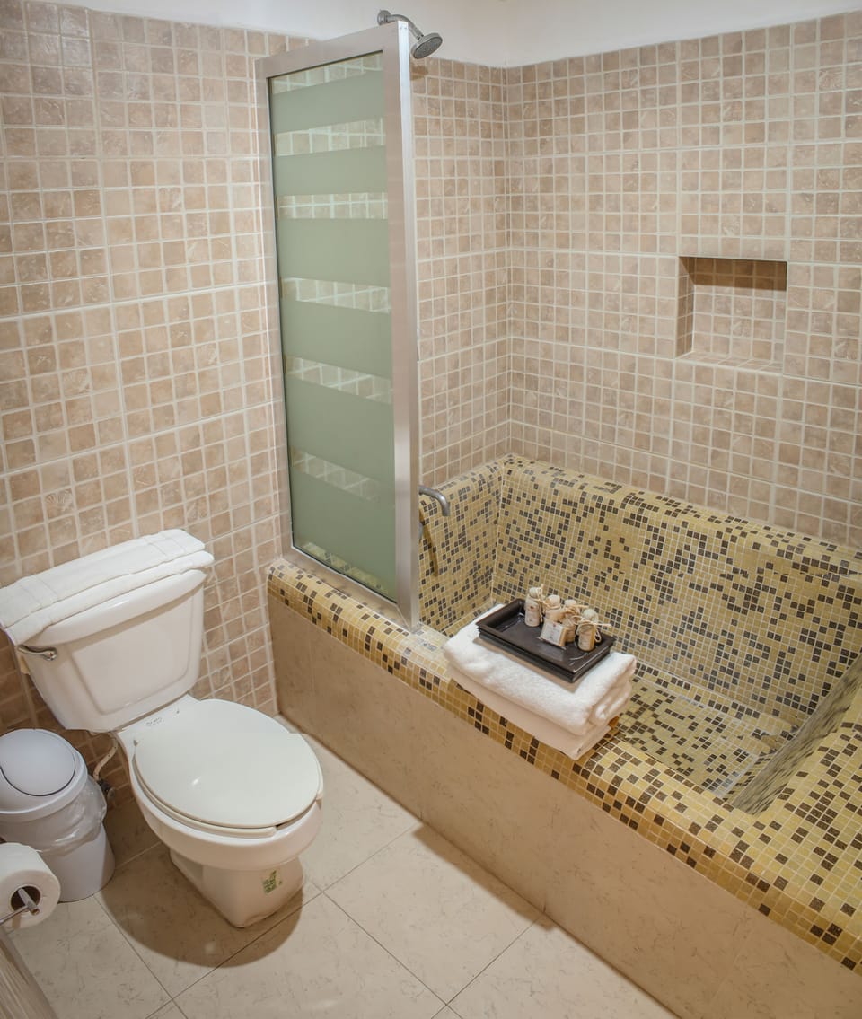 Junior Suite, 1 King Bed, Oceanfront | Bathroom | Hair dryer, towels