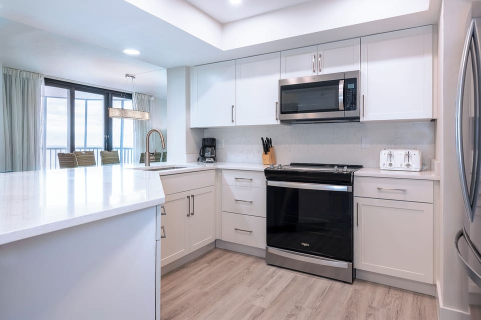 Two Bedroom Condo BEACHFRONT | Private kitchen | Full-size fridge, microwave, oven, stovetop