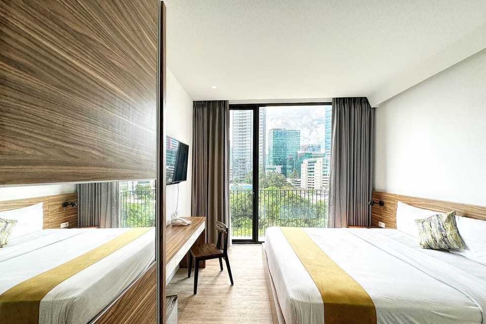 Deluxe Room | Premium bedding, pillowtop beds, minibar, in-room safe
