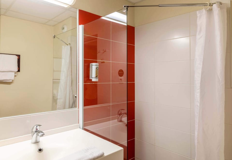 Shower, free toiletries, hair dryer, towels