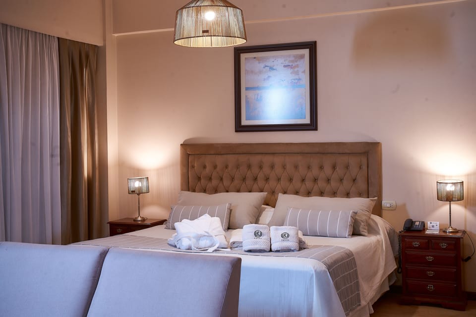 Premium bedding, down comforters, pillowtop beds, minibar