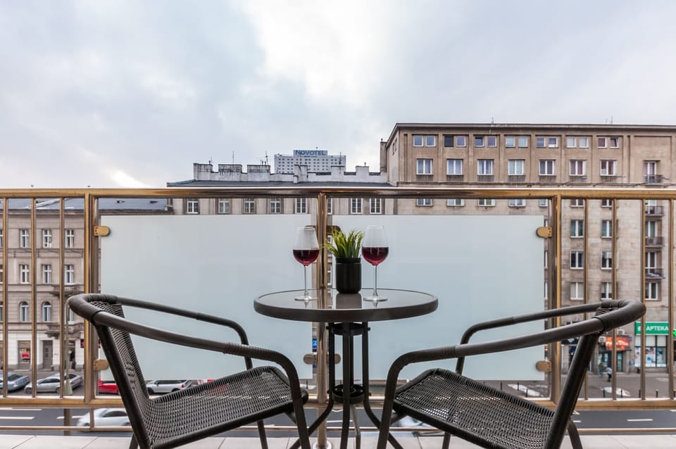 Balcony with garden furniture.