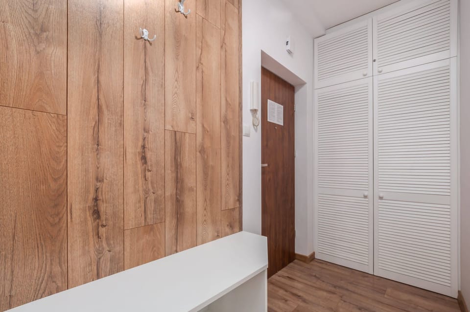 Hallway with a closet.