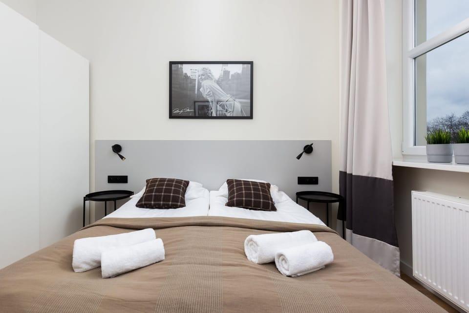 The bedroom features a luxurious double bed for a restful night's sleep. 