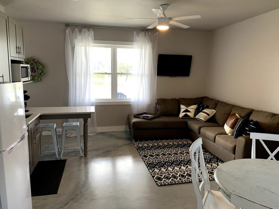 1st Floor Living Room with small fridge and mini bar area