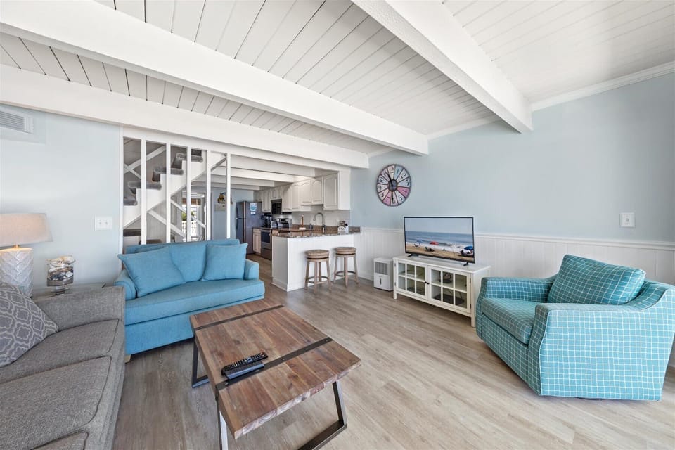 Relax in the Living Area with incredible Views, Free WiFi, & Flat Screen Cable TV.