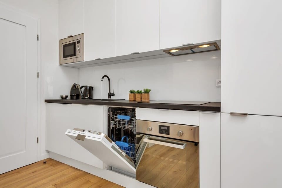 The fully equipped kitchenette includes everything you need for a home-cooked meal.