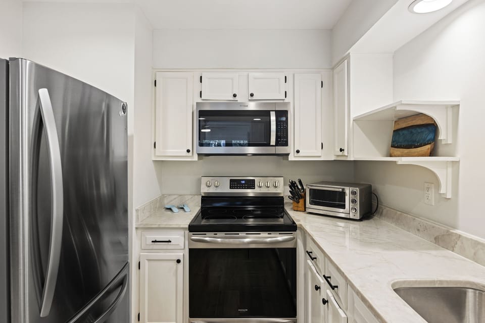 Beautifully upgraded kitchen with stainless appliances