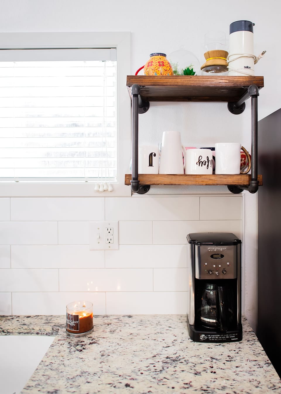 Kitchen in the main house has a regular drip coffee pot. 
