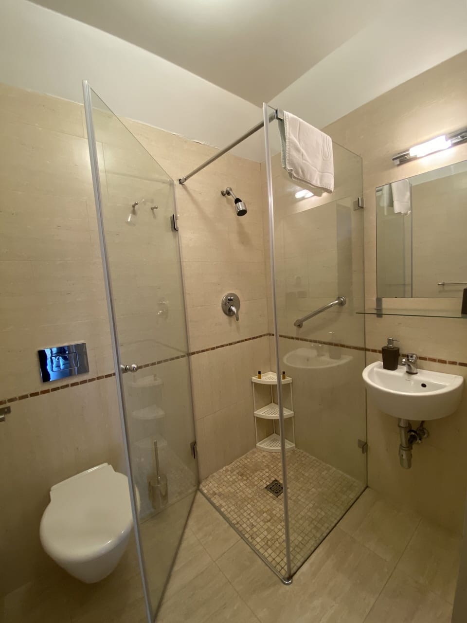 Shower, slippers, towels, soap