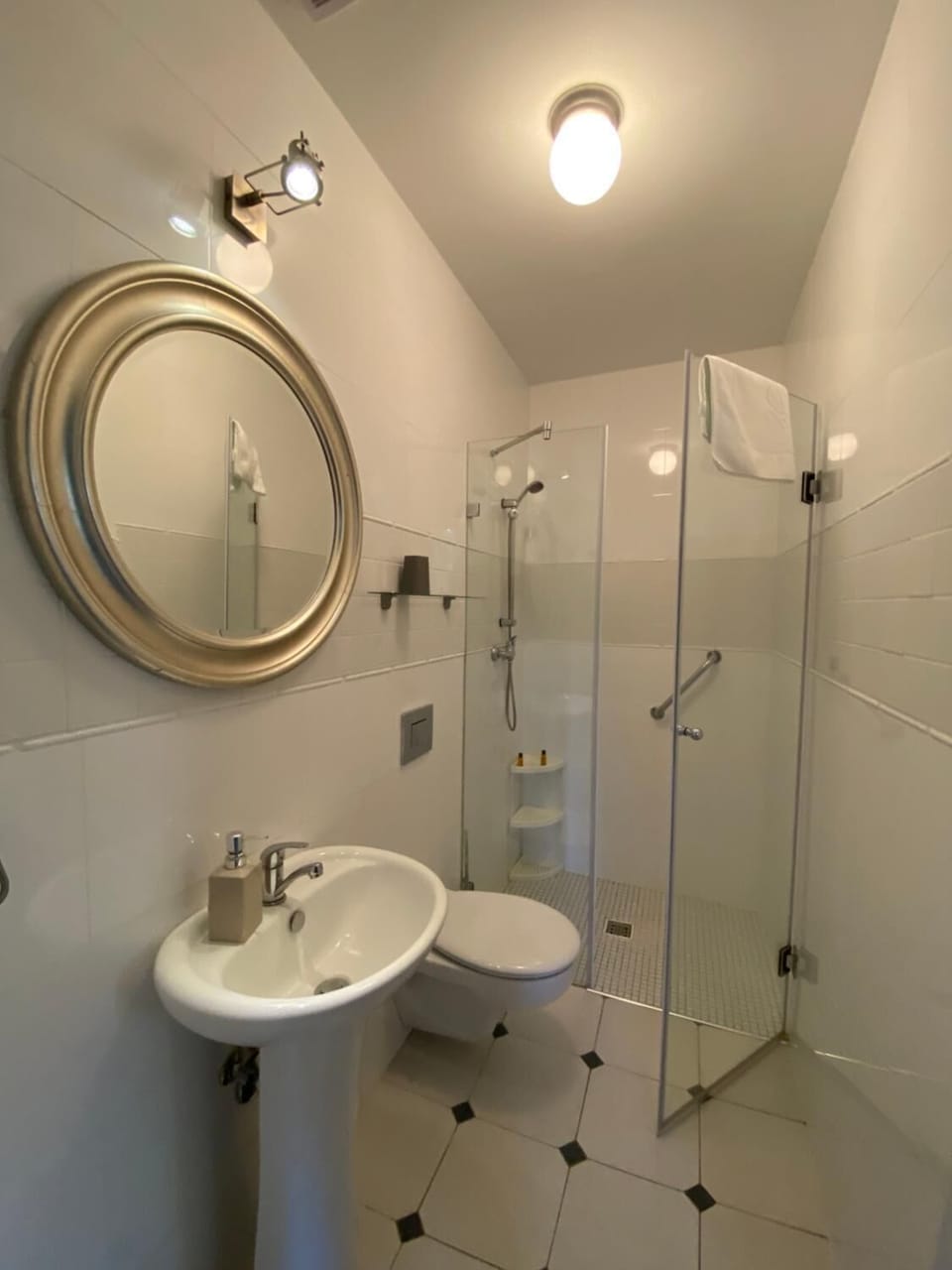 Shower, slippers, towels, soap