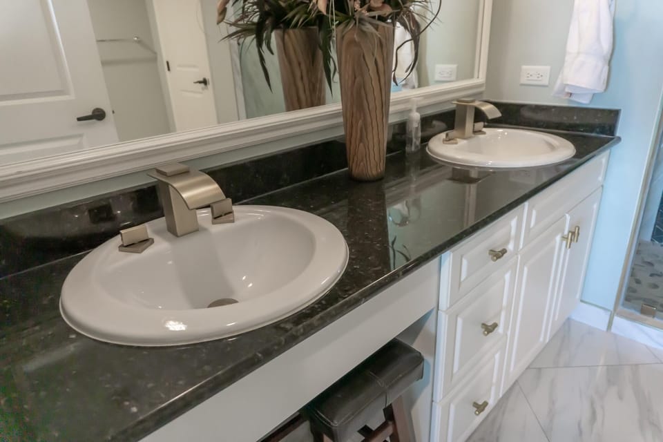 Double sinks, granite tops