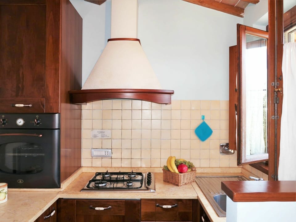 Cabinetry, Property, Countertop, Drawer, Wood, Building, Interior Design, Kitchen Stove, Lighting, Kitchen