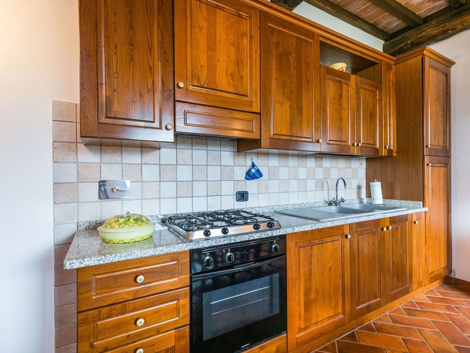 Countertop, Cabinetry, Furniture, Property, Building, Kitchen, Wood, Drawer, Kitchen Stove, Interior Design