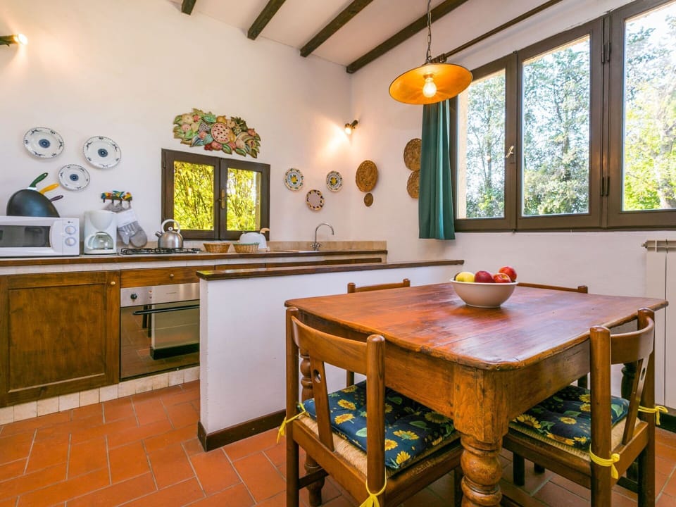 Table, Furniture, Property, Window, Building, Wood, Cabinetry, Lighting, Orange, Interior Design