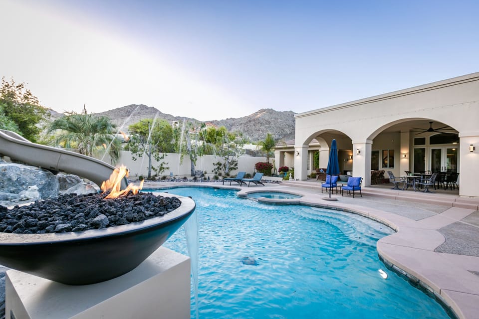 Waterslide, fire & water bowl, sea creatures in the pool & spa, mountain views!
