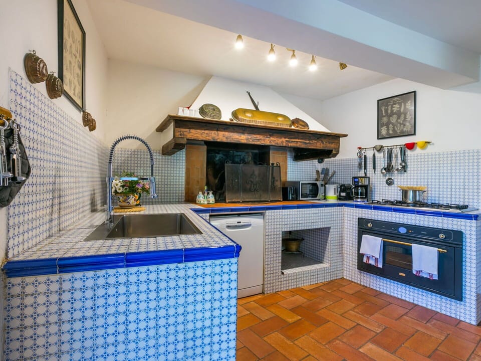 Kitchen, Interior Design, Flooring, Tile, Floor, Countertop, Kitchen Stove, Ceiling, Room, Kitchen Appliance