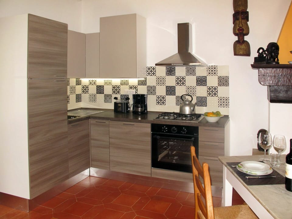 Room, Property, Interior Design, Tile, Furniture, Kitchen Stove, Floor, Kitchen, Building, Wall