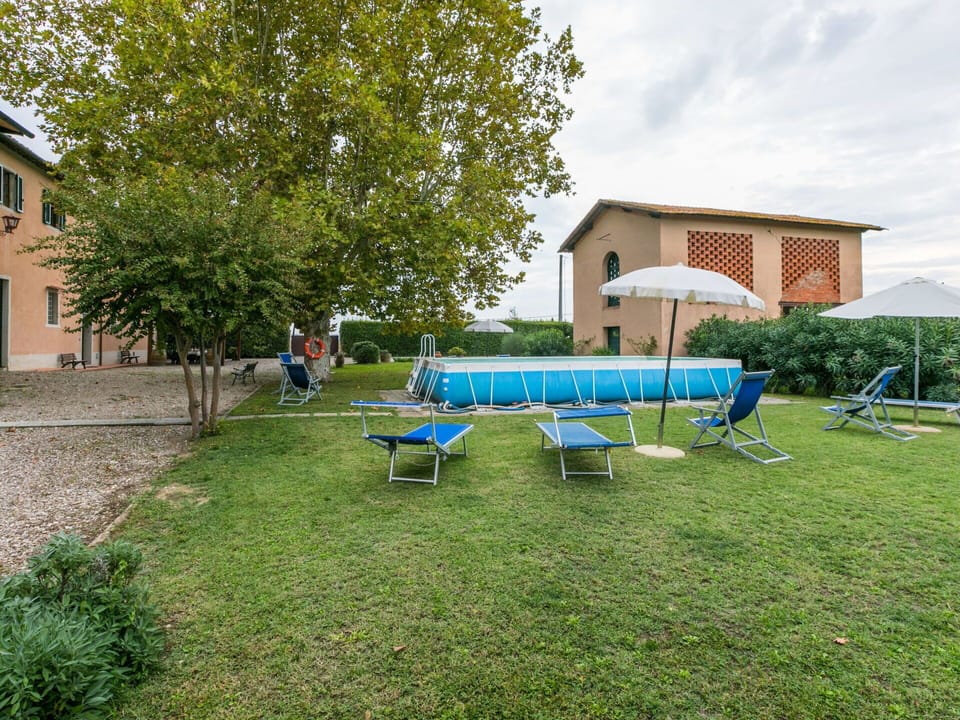 Plant, Property, Sky, Cloud, Tree, Shade, Grass, Window, Outdoor Furniture, Land Lot