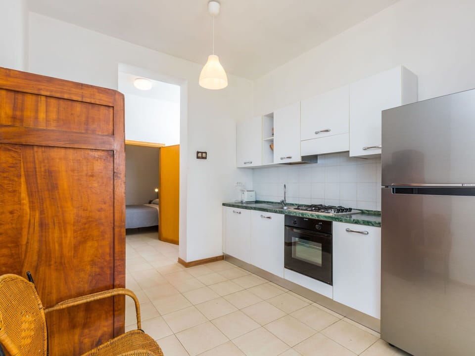 Cabinetry, Property, Countertop, Building, Furniture, Kitchen Stove, Kitchen, Wood, Kitchen Appliance, Interior Design
